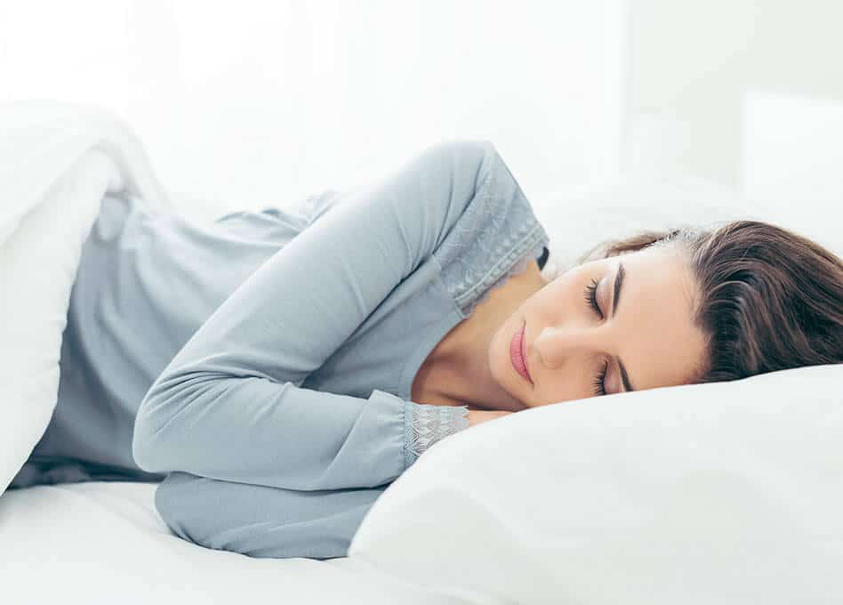 sleeping woman - why sleep is important for weight loss