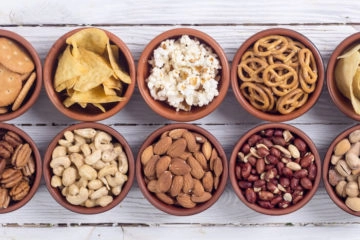 mixed, savory snacks like crisps, nuts, pocorn and co